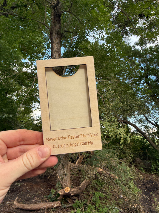 Never drive faster than your angle can fly - car visor clip
